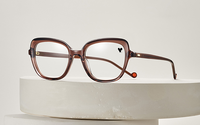 glasses on tan background